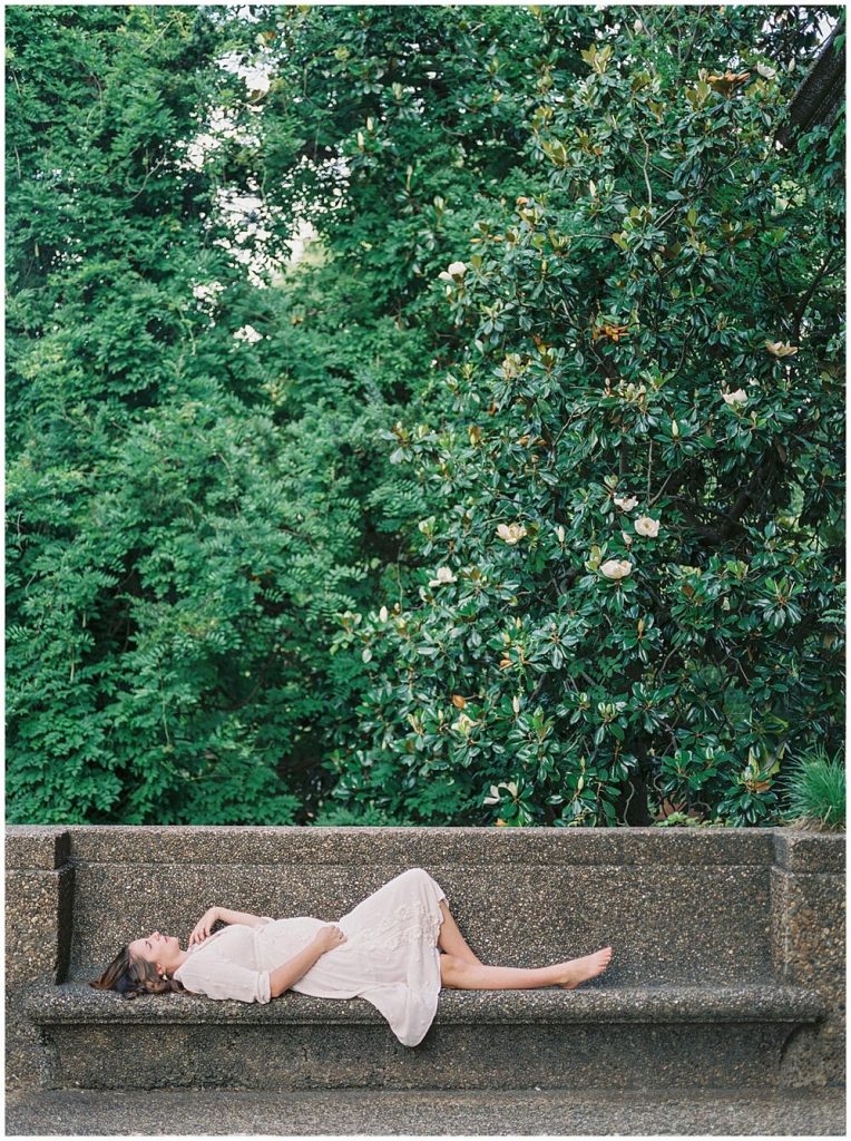 Expecting Mother Lying On Bench In Washington Dc Maternity Session At Meridian Hill Park