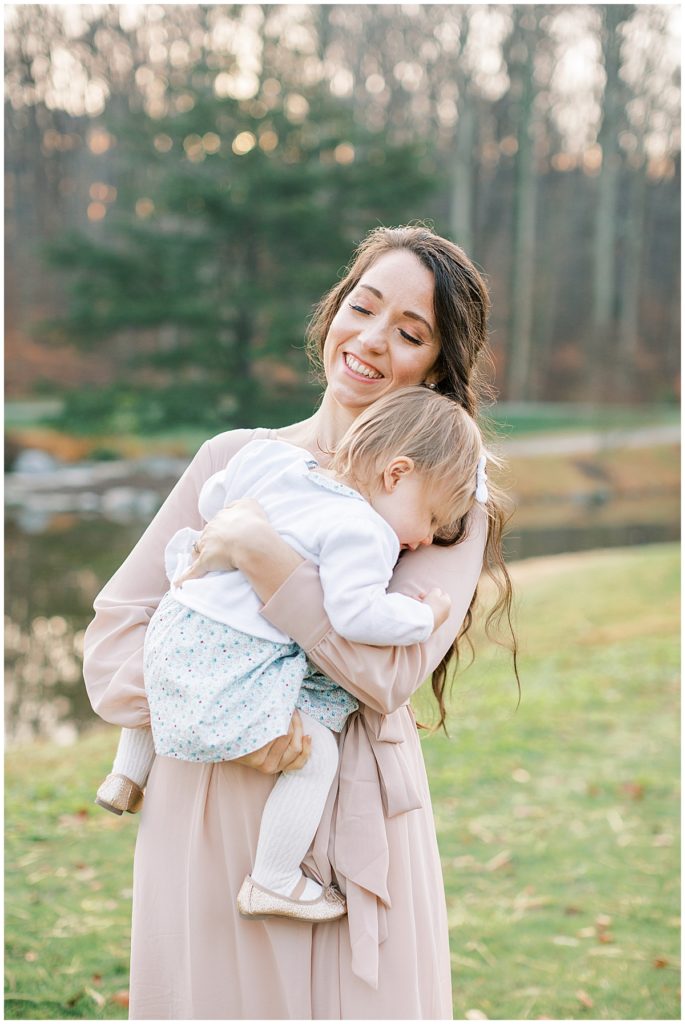 Mother Holds Daughter During One Year Old Baby Session In Brookside Gardens