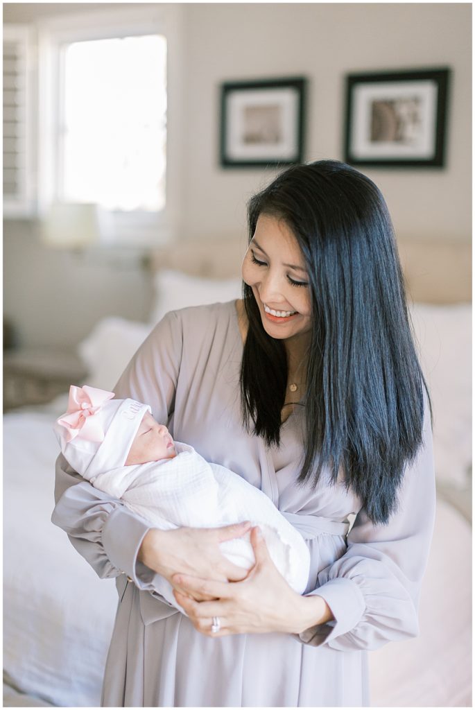 Mama Holds New Baby