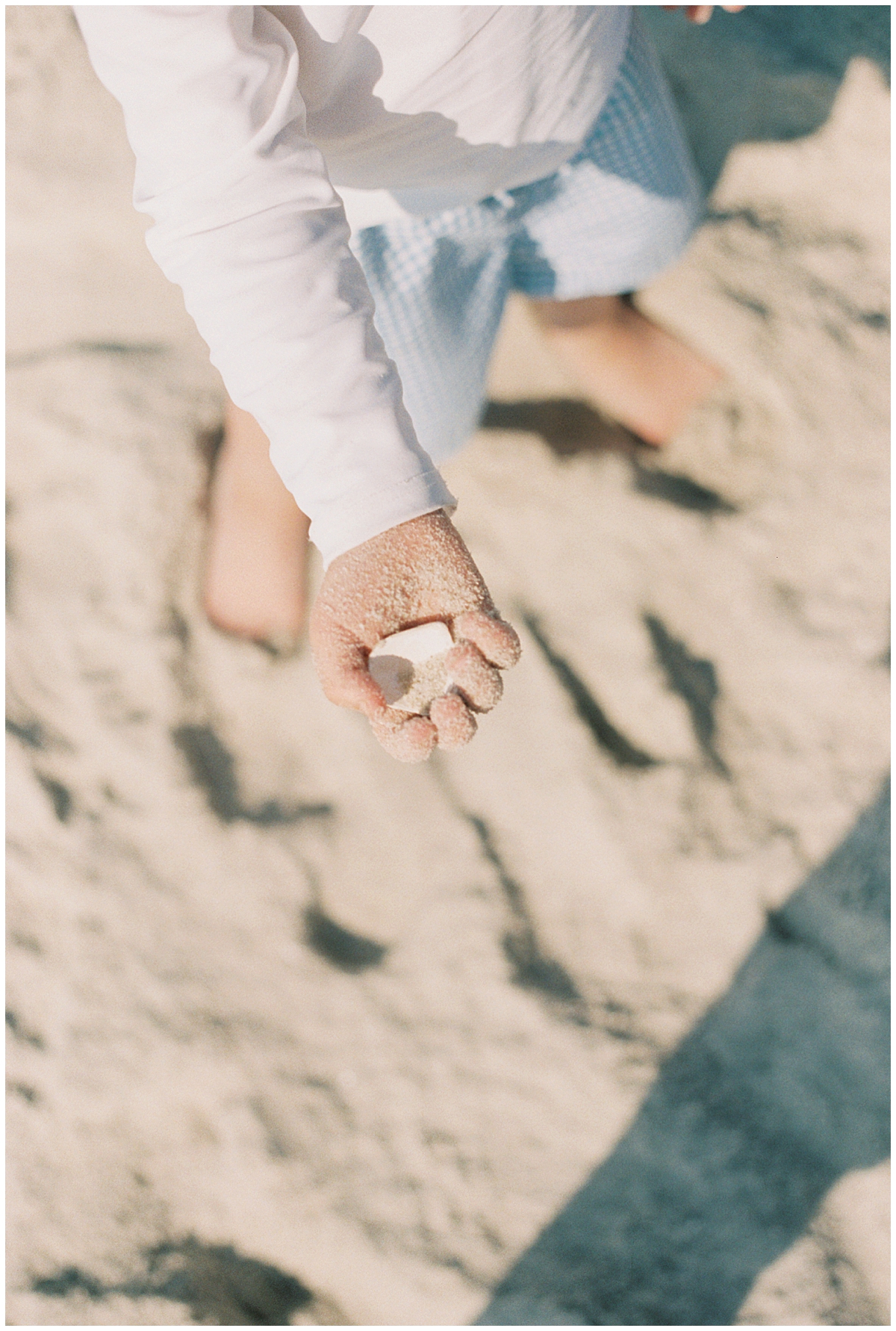 Maryland Film Photographer - Little Boy Holding Seashell