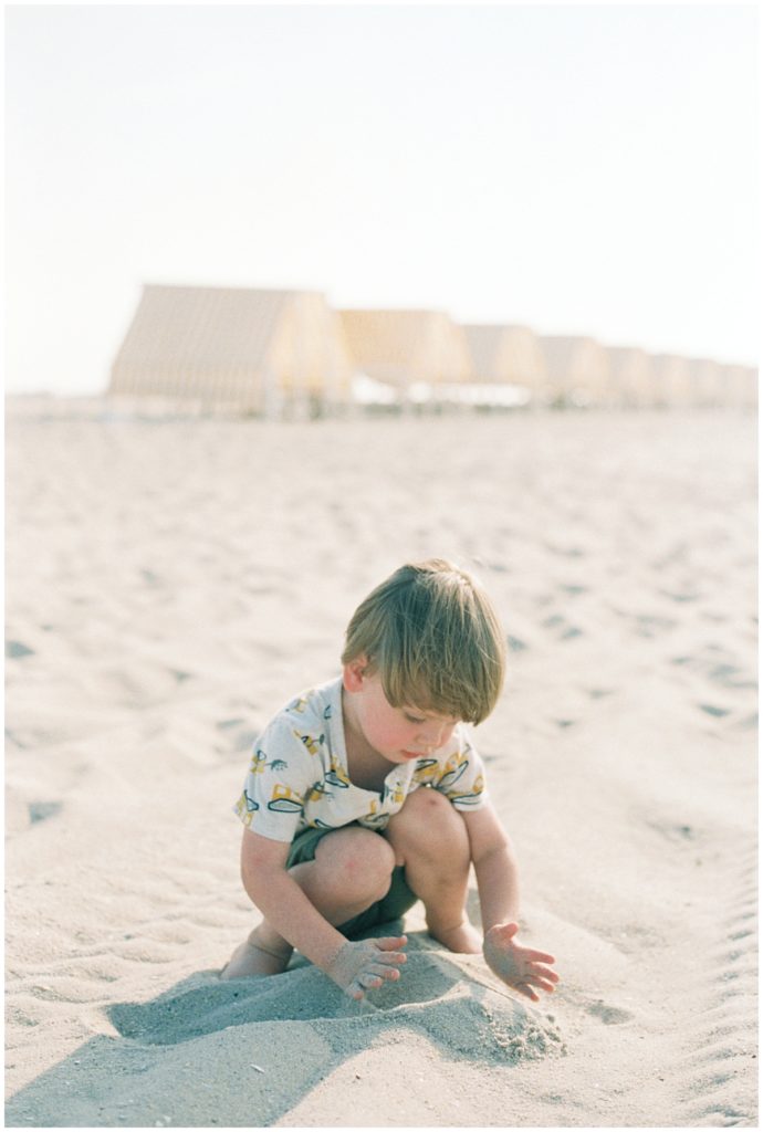 Little Boy Playing With Sand In Cape May, Nj - Maryland Film Photographer