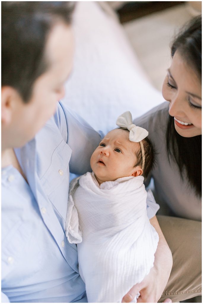 Baby Looks Up At Dad During Mclean Newborn Session