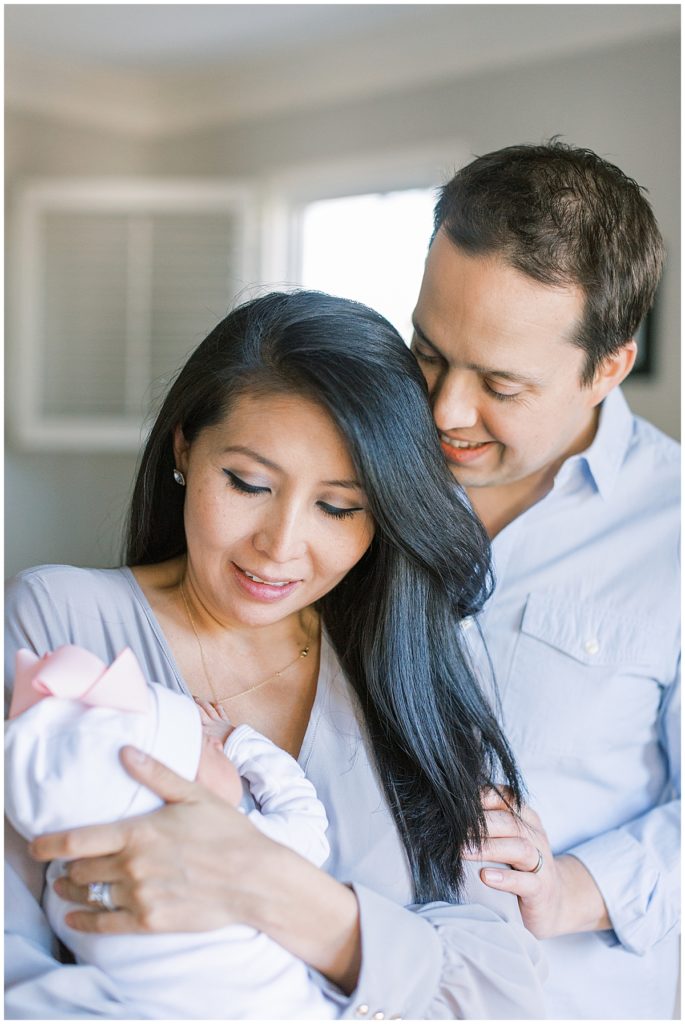 New Parents Snuggle During Dc Area Newborn Session