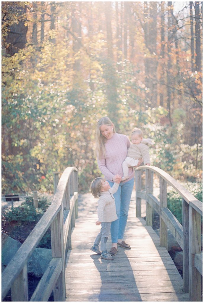 Mother And Children On A Bridge In Brookside Gardens