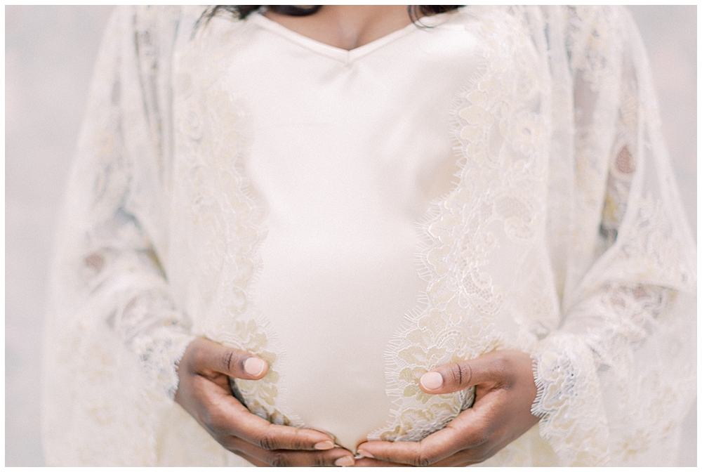 Pregnant Mother Holding Her Belly