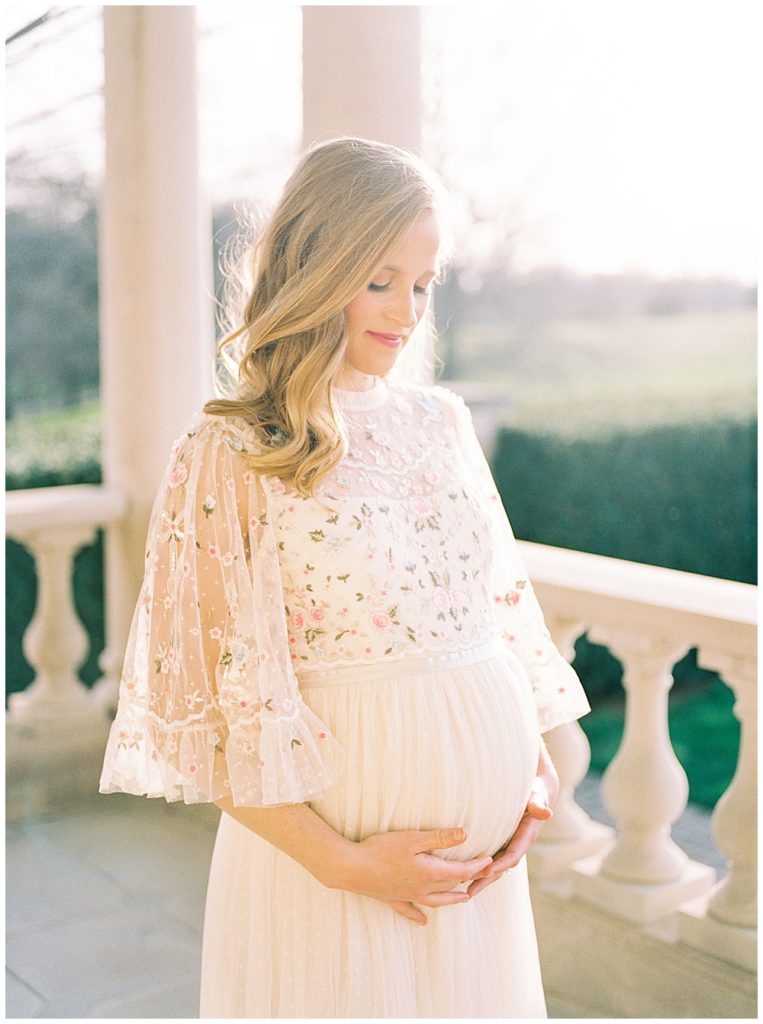 Gorgeous Expecting Mother Stands In The Light During Maternity Session At The Great Marsh Estate