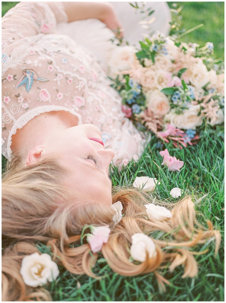 Pregnant Mother Lays On Ground During Her Northern Va Maternity Session At The Great Marsh Estate