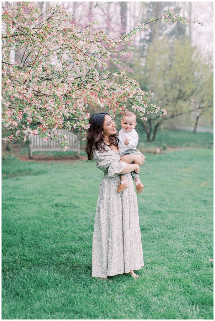 Mother Wearing A Nothing Fits But Dress During A Family Photo Session