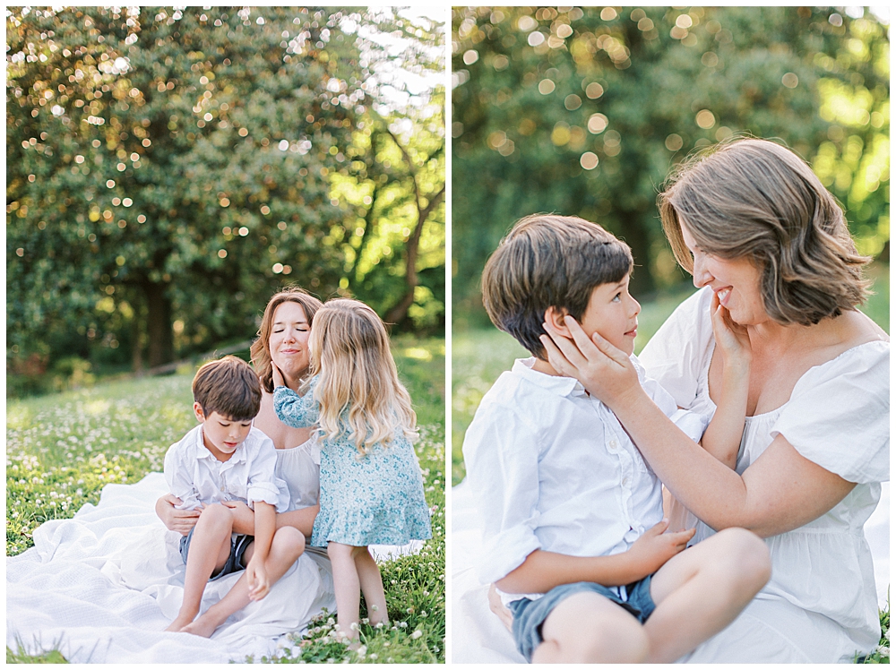 Mother Sits With Her Children In Field