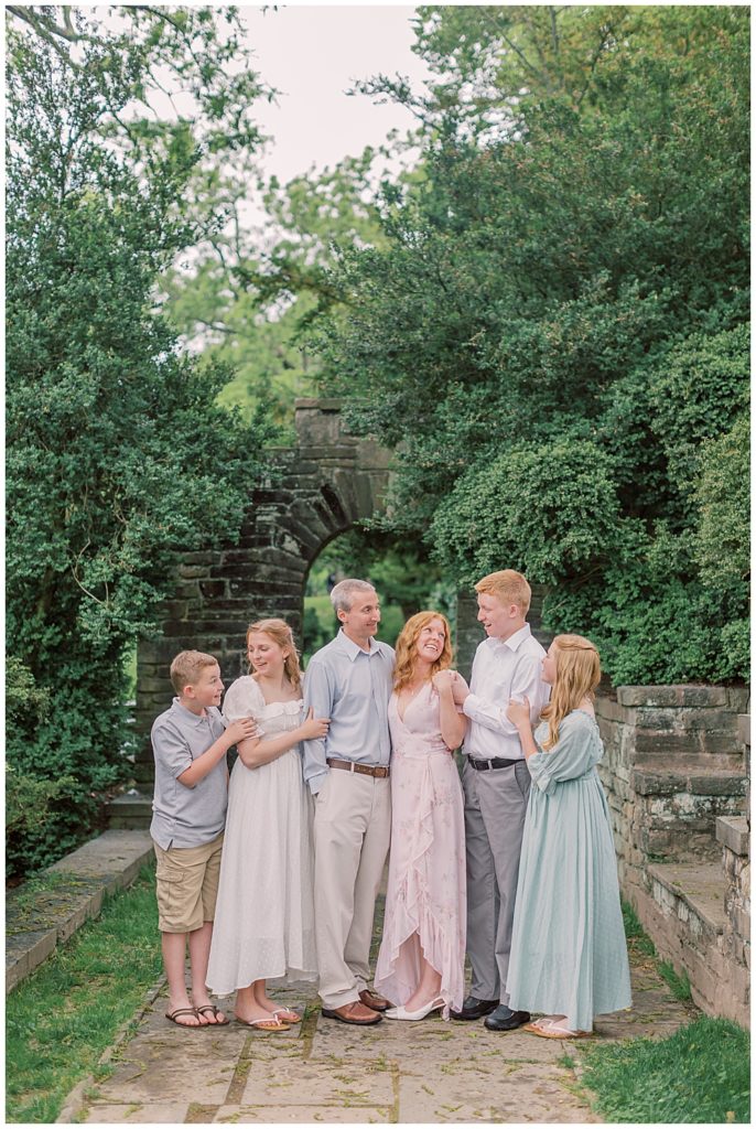 Mother And Father With Their Teen Children Outside Of Glenview Mansion During Their Maryland Photo Session | Northern Virginia Family Photographer