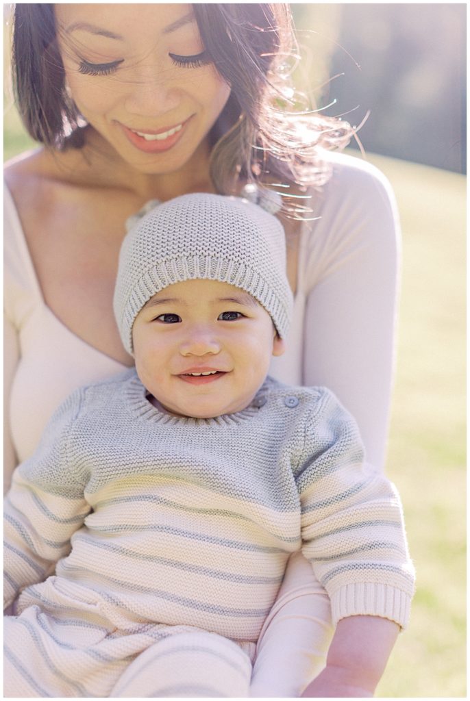 Mother Holds Baby Boy At Brookside Gardens