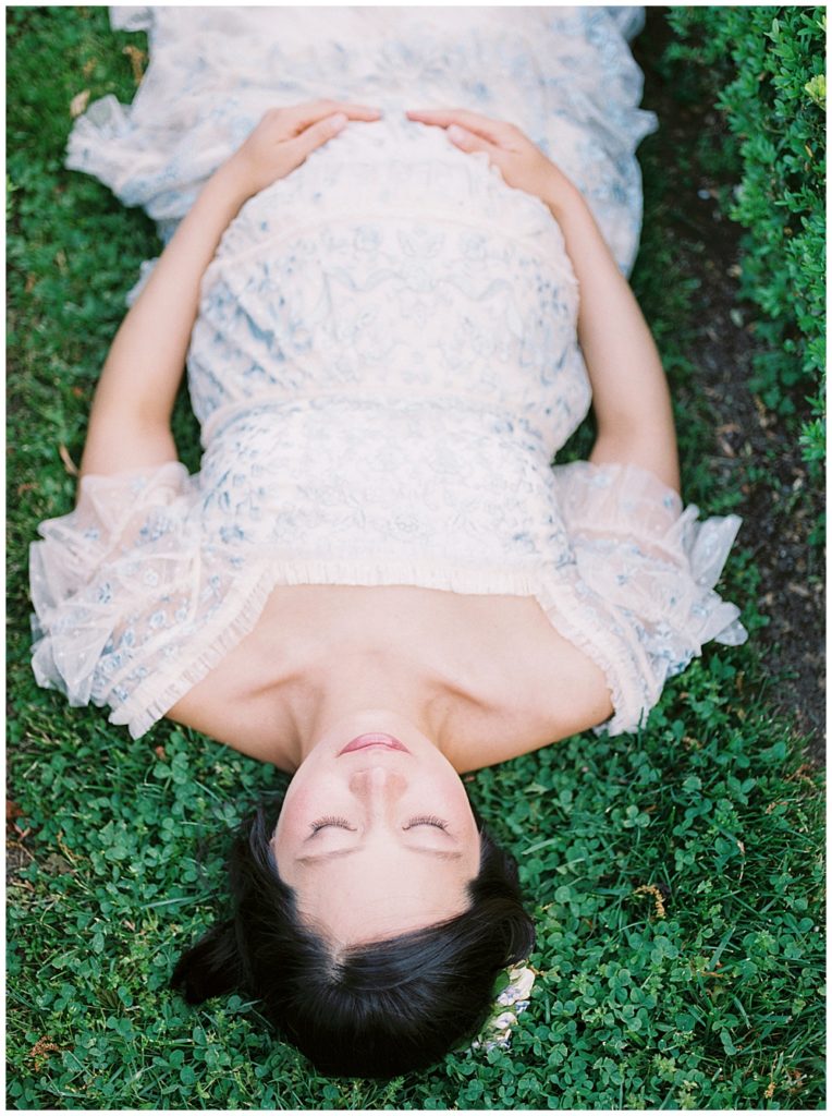 Pregnant Woman Lays Down During Maternity Session At Tudor Place In Washington, D.c.