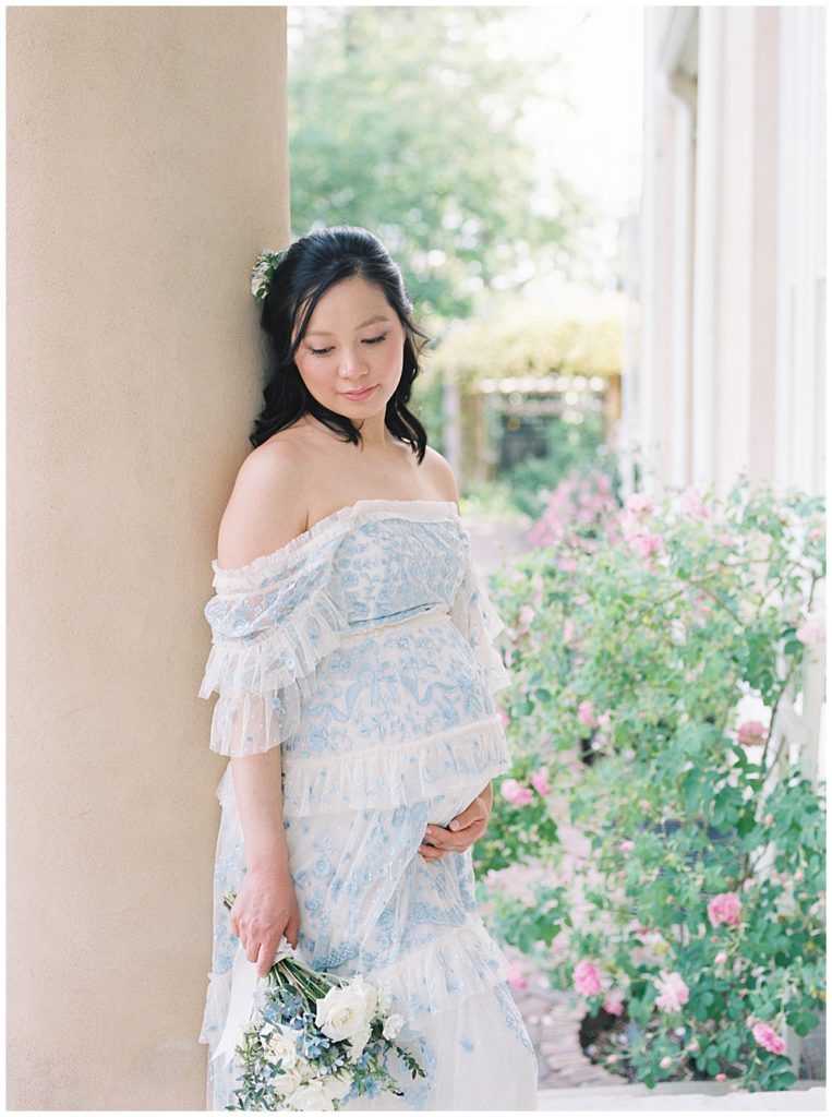 Pregnant Woman Leans Up Against A Column At Tudor Place