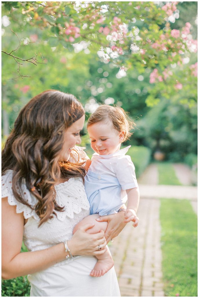 Family Photographer Washington Dc | Mother Holds Her One Year Old Son At Tudor Place During Their Dc Family Session