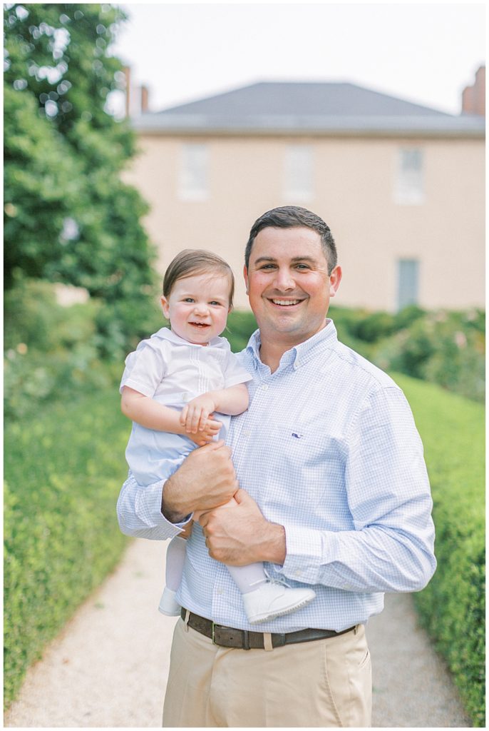 Dad Holds His One Year Old Son Smiling In Washington Dc