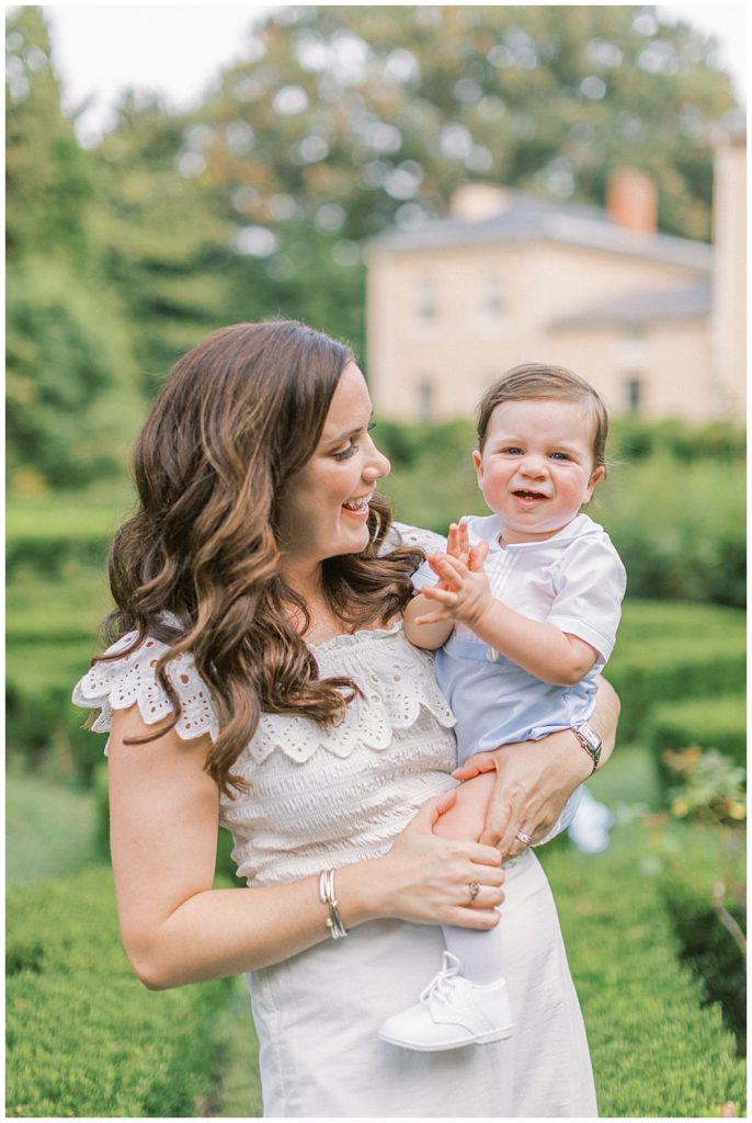 Mother Smiles At Her One Year Old Son