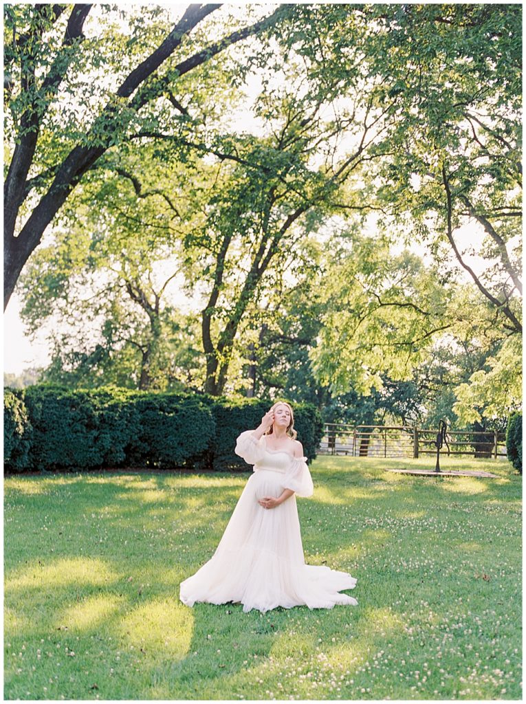 Pregnant Woman Wears A Maternity Gown On A Beautiful Summer Day