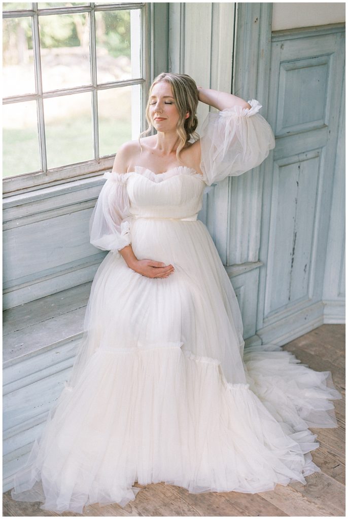 Washington Dc Maternity Photographer | Pregnant Woman Sits In Window At Salubria