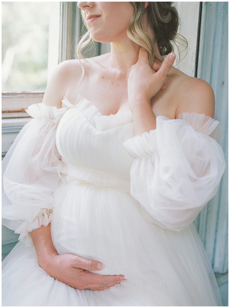 Pregnant Mother Sits By Large Window At Salubria, Virginia