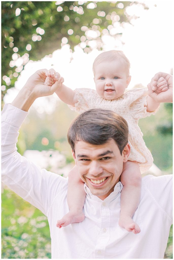 Little Baby On Top Of Her Dad's Shoulders