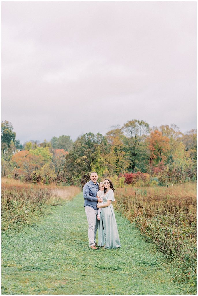 Family Stands Together For A Portrait At The Howard County Conservancy