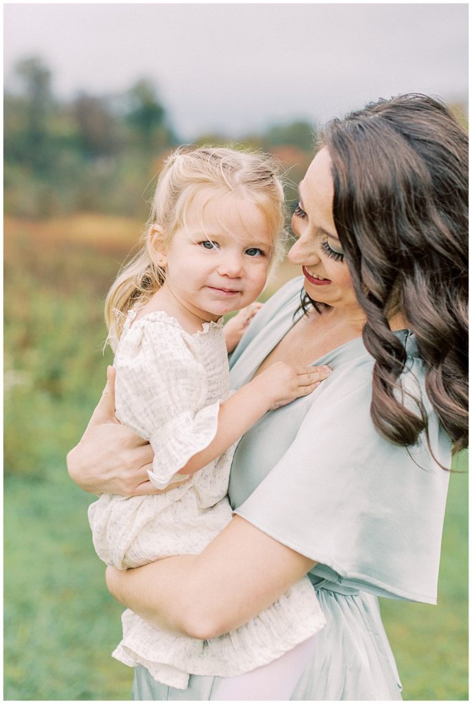 Mother Holds Her Little Girl During Their Family Photos At The Howard County Conservancy Md