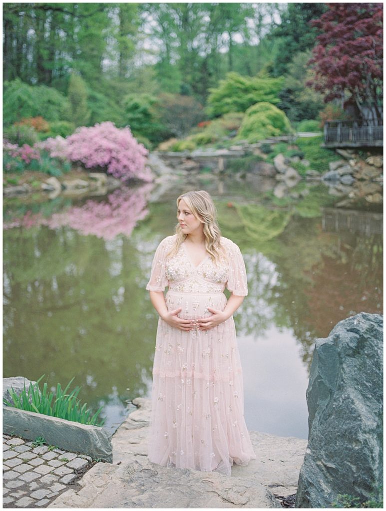 Maternity Session At Brookside Gardens With A Mother Wearing A Pink Needle &Amp; Thread Gown.