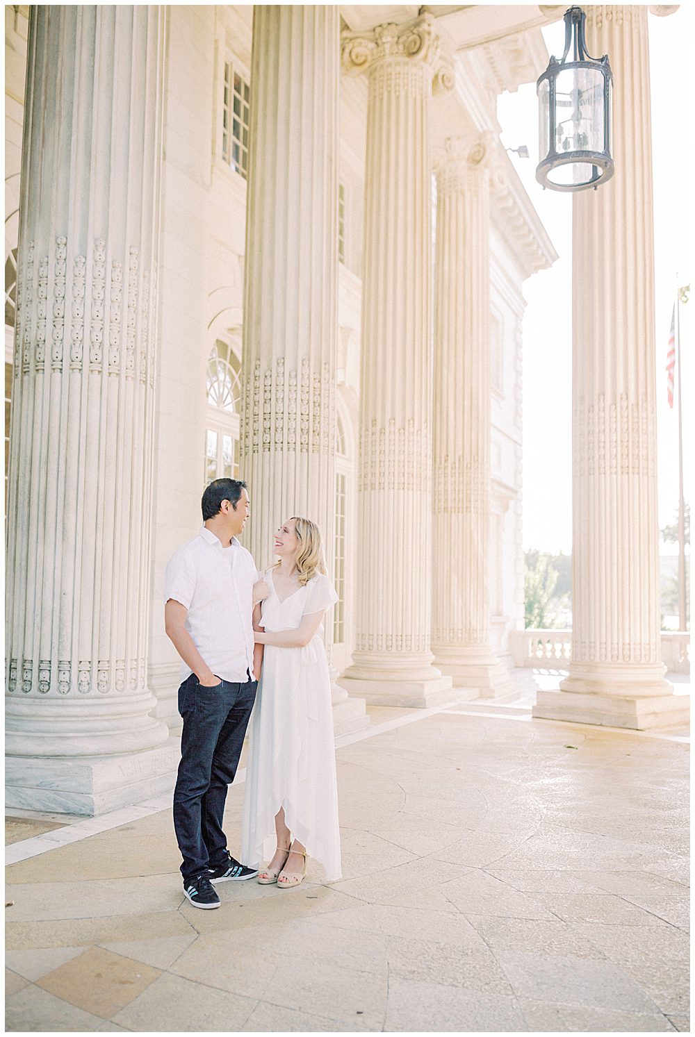 Husband And Wife Stand Together During Their Family Photos At The Dar Constitution Hall.