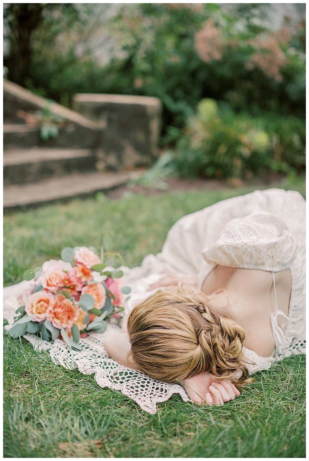 Blonde Mother Lays On Crotchet Blanket With Roses And Newborn Girl.