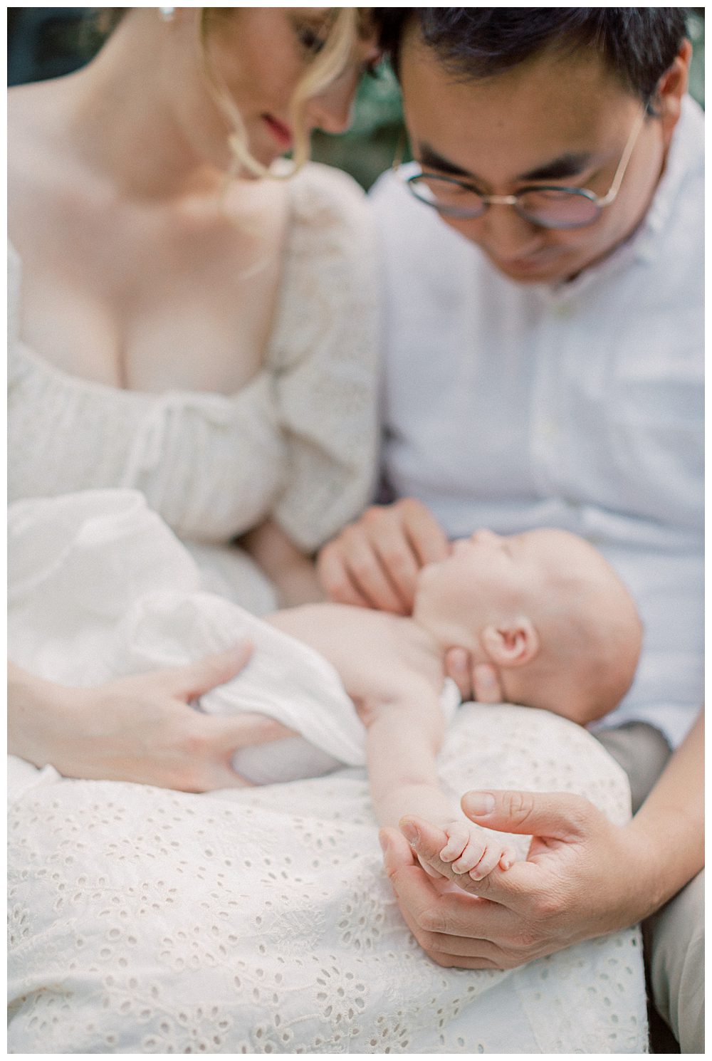 Newborn Baby Wraps Fingers Around Dad During Alexandria Va Newborn Session.