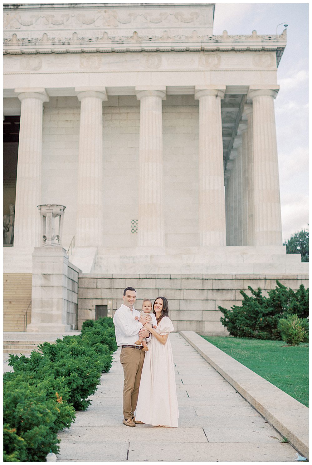 Mother, Father, And Toddler Son Stand In Front Of The Lincoln Memorial During Dc Monuments Family Photo Session.