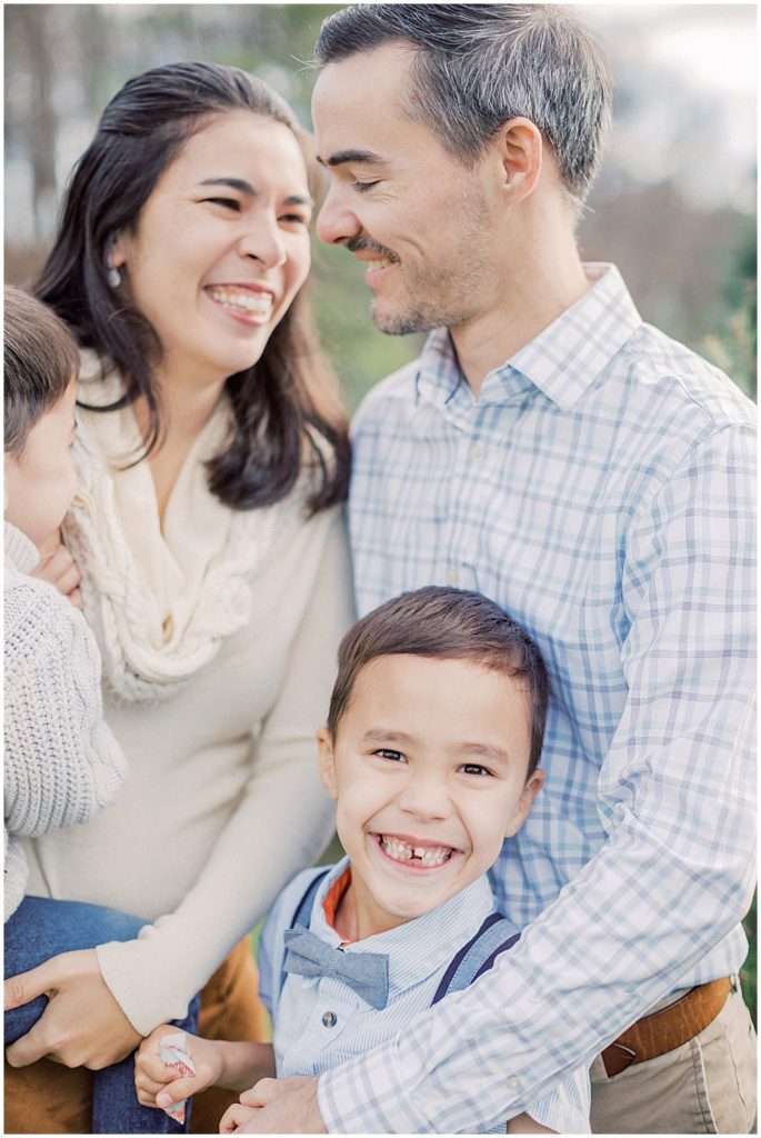 Family Smiles During Christmas Mini Sessions At Butler's Orchard.