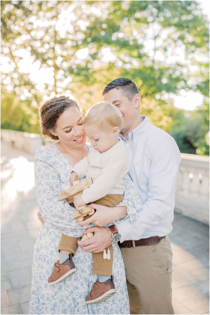 Mother And Father Hold Their Son Close To Them During Dar Constitution Hall Photos For Family Session.