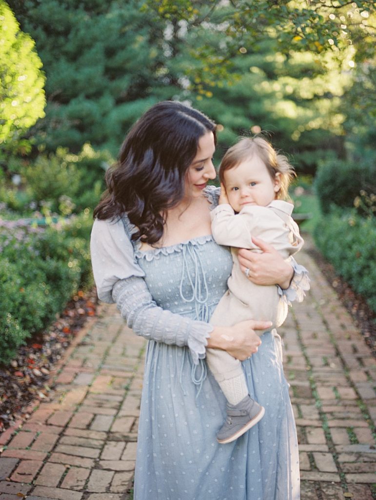 Mother Leans Into Her Son During Dc Family Photos At Tudor Place Photographed By Georgetown Family Photographer Marie Elizabeth Photography.