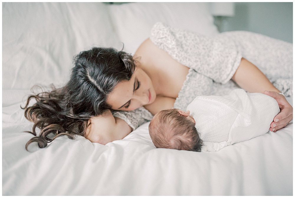 Mother Lays Down With Baby Boy During Dc Row House Newborn Session.