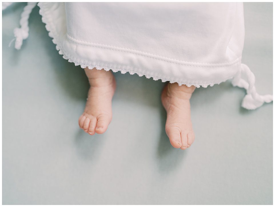 Little Baby Toes Against A Blue Backdrop.