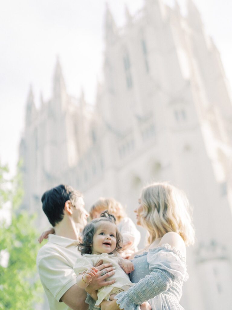 Bishop's Garden Photos Of A Family Standing With The National Cathedral As A Backdrop.