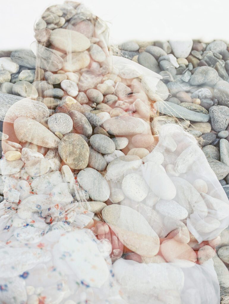 A Double Exposure Of Rocks And A Mother And Daughter.