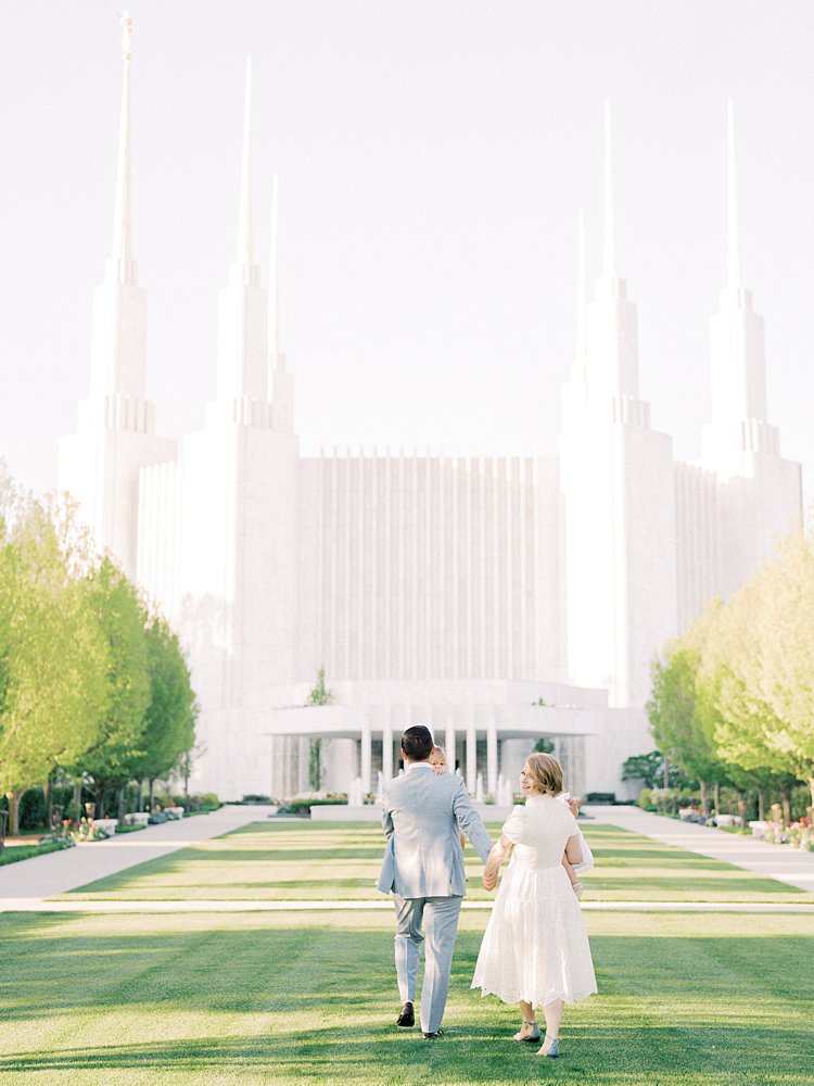 View Of A Family Walking On The Lawn Towards The Mormon Temple In Washington Dc.