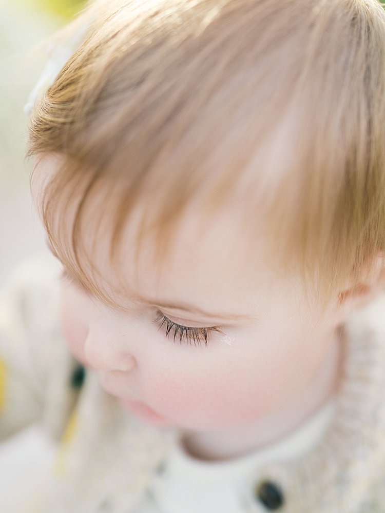 A Close-Up View Of A Baby Girl's Eyelashes.