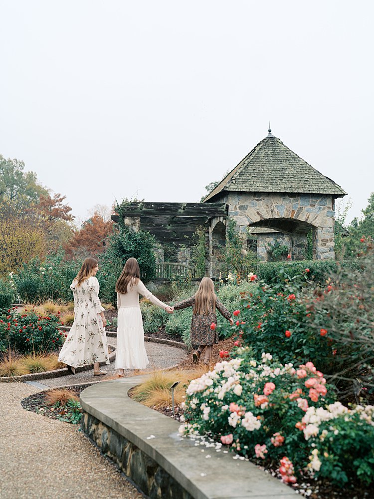 A Mother Walks With Her Two Daughters During Their Lewis Ginter Botanical Garden Photos In The Fall.