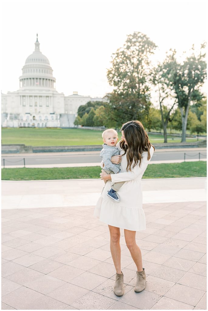 Mother holding her toddler son in DC during a family photo session