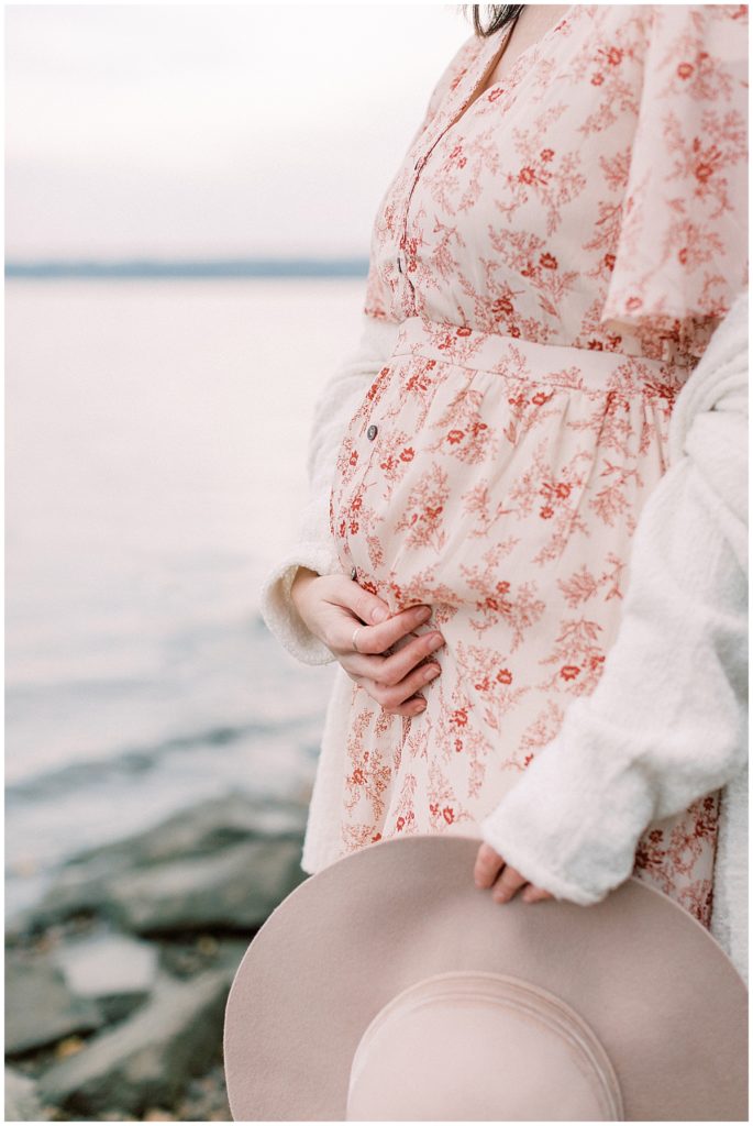 Baby bump during maternity session along the Potomac River.