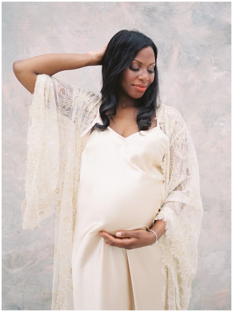 Expecting mother wears vintage robe during her DC maternity session