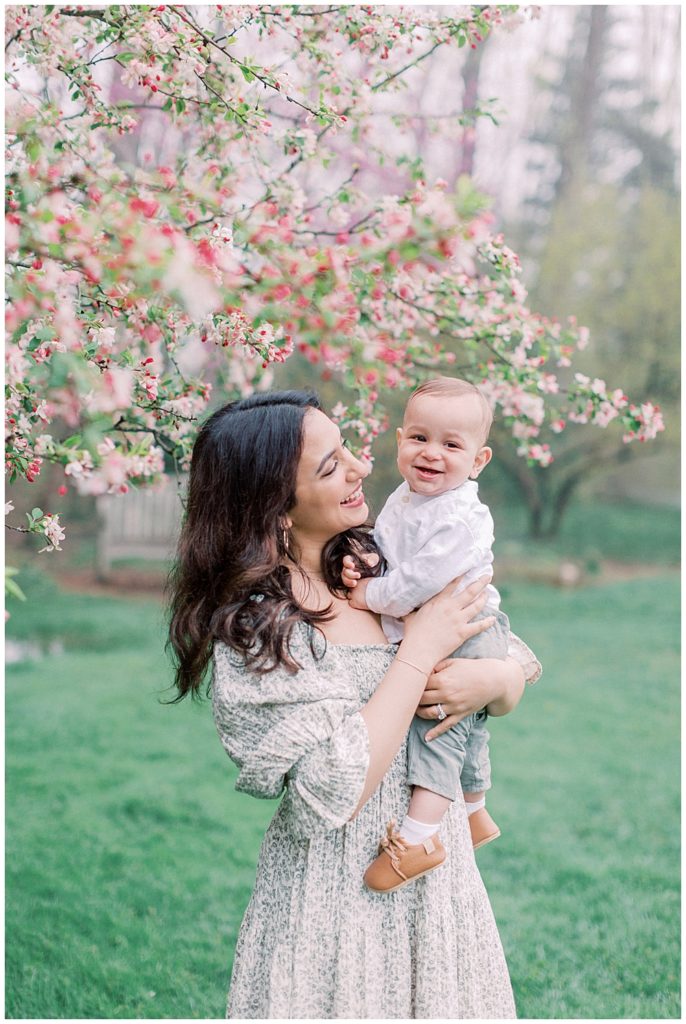 Cherry blossom photo session at Brookside Gardens with mother and baby.