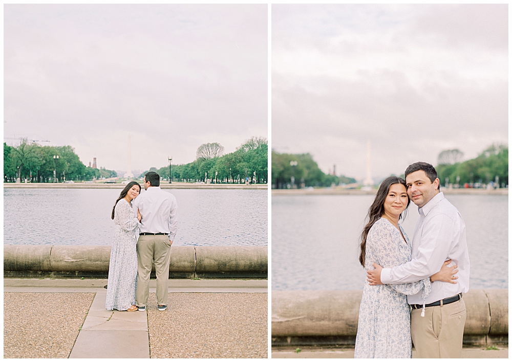 Husband and wife stand together in front of the Washington Monument during their family photo session in Washington, D.C.