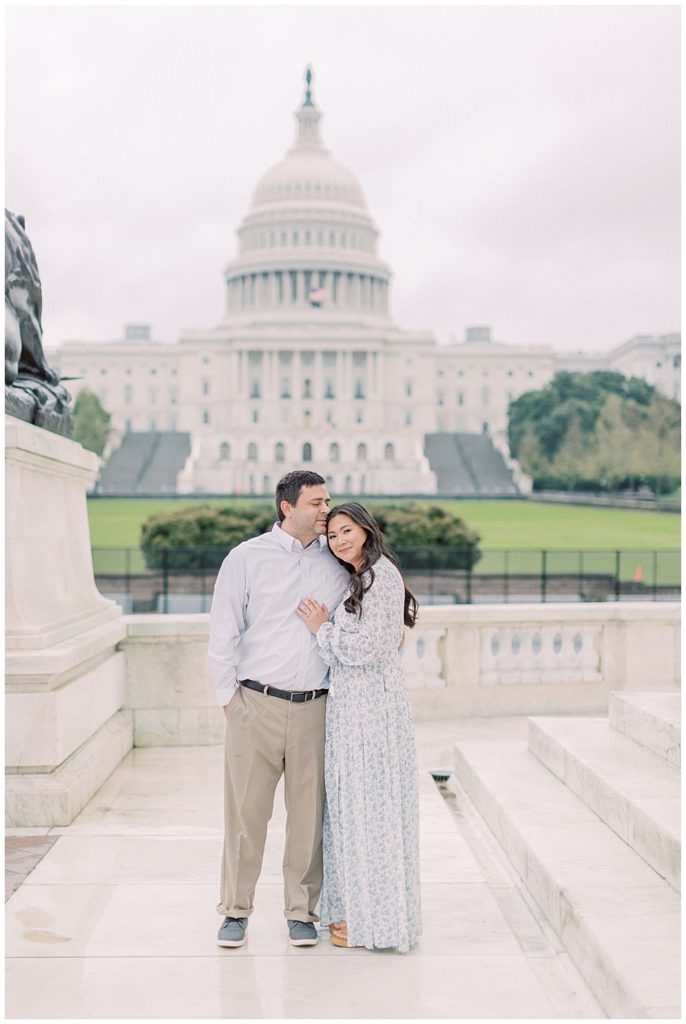 Mother and father stand together outside the Capitol Building during their DC family photo session