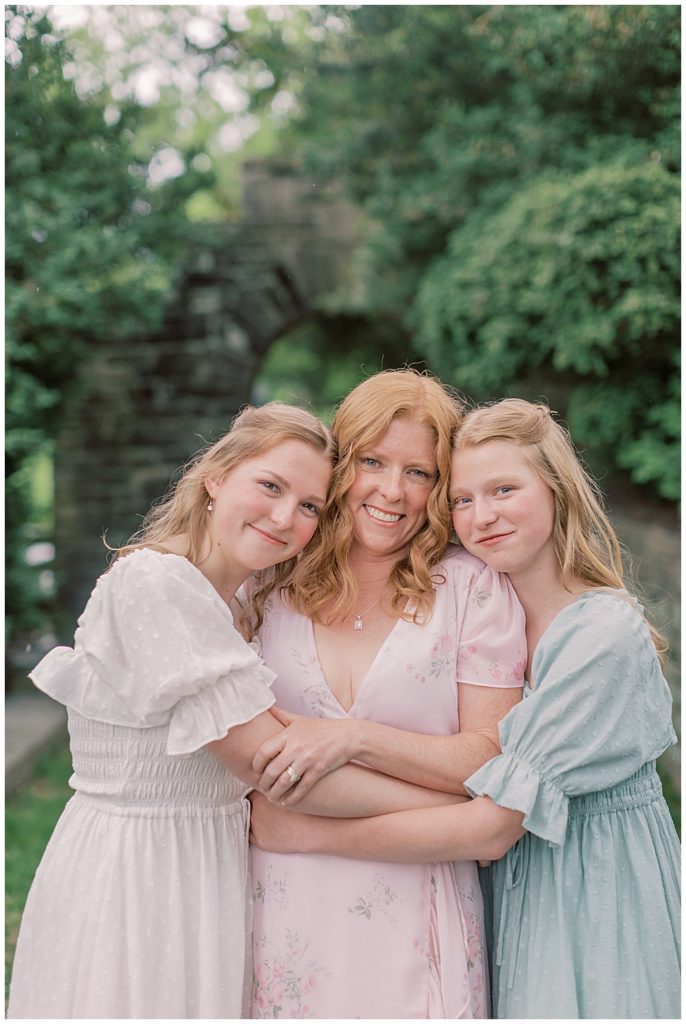 Northern Virginia Family Photographer | Mother stands with her two grown daughters