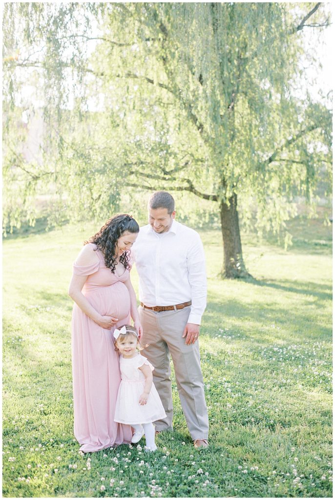 Family stands together during their Maryland maternity session