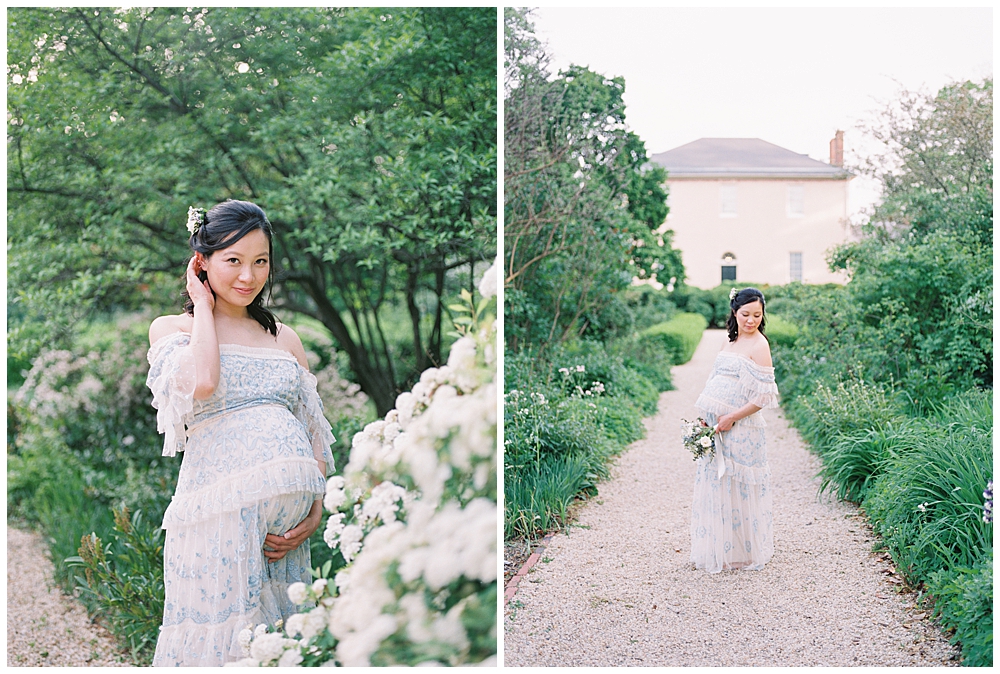 Pregnant woman stands with flowers at Tudor Place during a maternity session